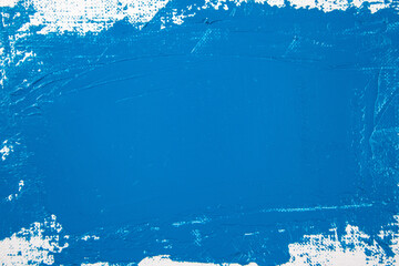 saturated blue abstract background, applied toning primer on a white surface