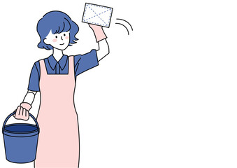 雑巾で窓ガラスを拭く女性