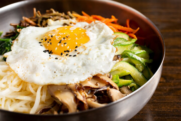 A closeup view of a bibimbap bowl.