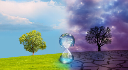 Dead tree on one side and living tree on the different side - Earth on hourglass is slowly melting - Hourglass inside glass globe 