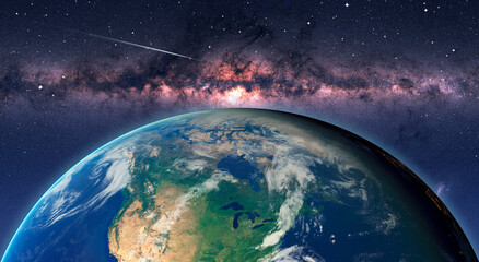 Planet Earth in front of the Milky Way galaxy 