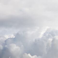 Fototapeta na wymiar Cloudy sky background. Sunlight shining through white clouds.