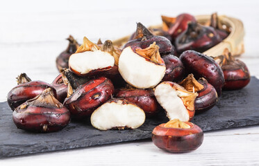 Vegetable water chestnuts on a white background