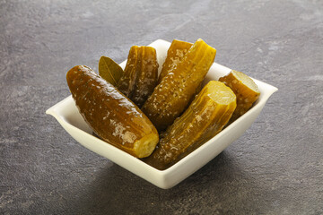 Marinated pickled cucumbers in the bowl