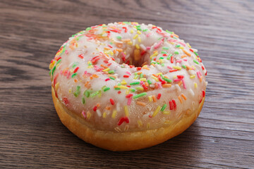 Sweet glazed vanilla donut with icing