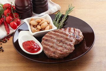 Grilled beef burger cutlet with sauce
