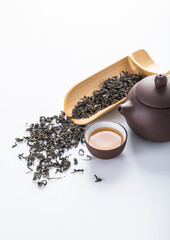 teapot and cup of tea on wooden table
