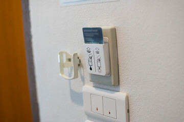 Key card to control electrical switches in the hotel room.
