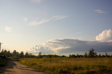 landscape with majestic beautiful dramatic pre-threatening sky. Cloudy sky