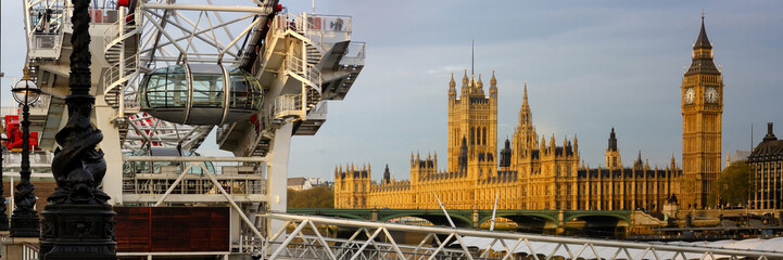 LONDON, UK - MAY 03, 2008:  Panorama of London Eye with Houses of Parliament and Big Ben in the Background - obrazy, fototapety, plakaty
