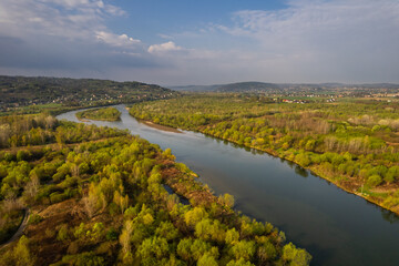 Fototapeta na wymiar Dunajec River in Lesser Poland at Spring Morning. Aerial Drone View