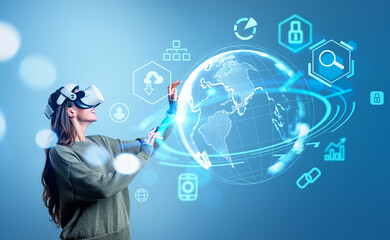 Smiling woman in vr glasses hands touch earth sphere with digital icons