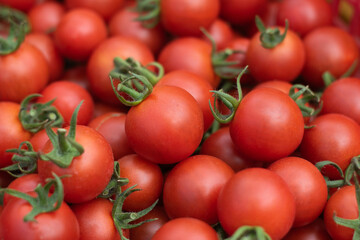 Fresh red tomato fruits background.