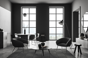 Chill room interior with chairs and coffee table, panoramic window