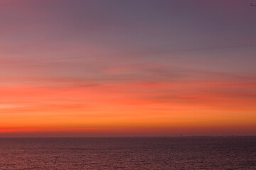 Naklejka na ściany i meble Wschód słońca nad morzem Bałtyckim