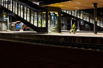 Night workers on train station