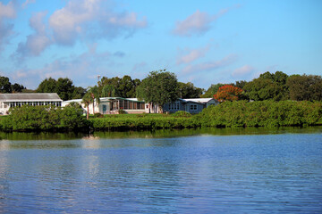 Fototapeta na wymiar Mobile homes on the shore of a lake