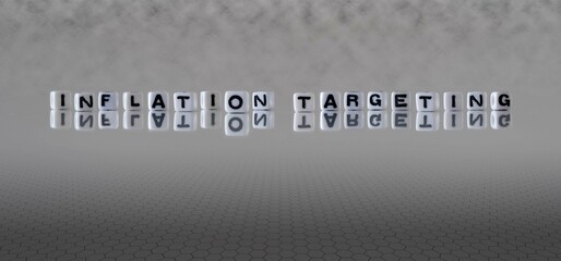 inflation targeting word or concept represented by black and white letter cubes on a grey horizon background stretching to infinity