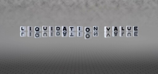 liquidation value word or concept represented by black and white letter cubes on a grey horizon...