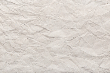 Obraz premium Crumpled paper background texture. Brown paper background