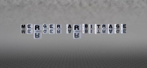 merger arbitrage word or concept represented by black and white letter cubes on a grey horizon...