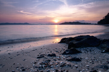 Beautiful landscape with colorful sunset on the sea.