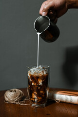 glass of coffee with milk on the table