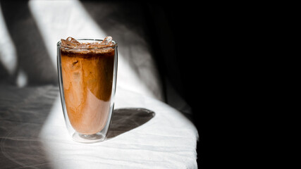 glass of iced coffee with milk on the table