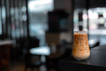 glass of iced coffee with milk on the table