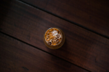 glass of iced coffee with milk on the table