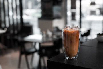 glass of iced coffee with milk on the table