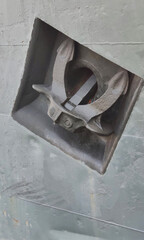 Raised anchor in the ship's hull. Sea ship.