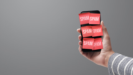 Spam texts on a smartphone - obrazy, fototapety, plakaty