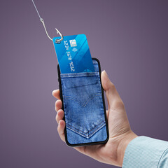 Hacker stealing credit card information on a smartphone