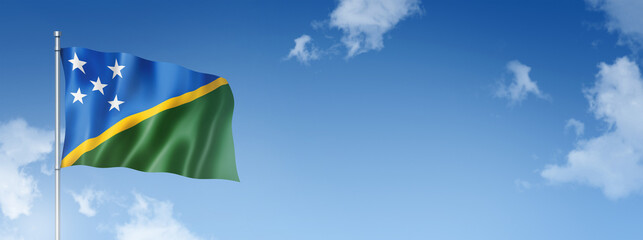 Solomon Islands flag isolated on a blue sky. Horizontal banner