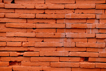 Orange brick wall in of the building