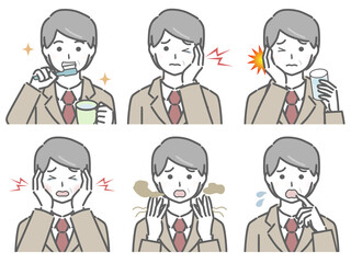 口の中に異常があるスーツの中年男性