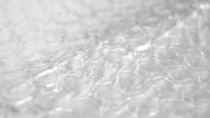 Polyethylene packaging bubble wrap texture. Macro. Rotation