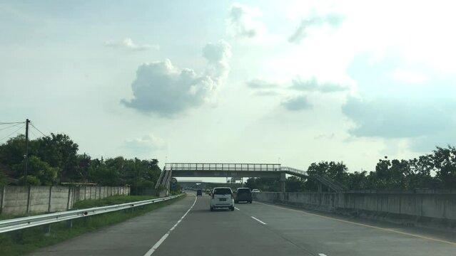 Point of view driving on toll road highways, East java, Indonesia