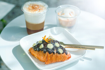 Chocolate croissant with drinks