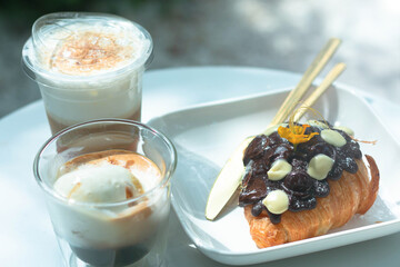 Chocolate croissant with drinks