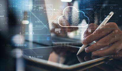Cloud technology. Data storage and backup. Networking and internet service concept. Man using laptop computer and digital tablet with cloud computing diagram.