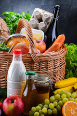 Wicker basket with assorted grocery products