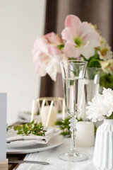 The wedding table setting and decor on wooden table in rustic style