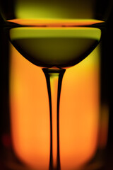 Cocktail drink on a colourful background. Selective focus.