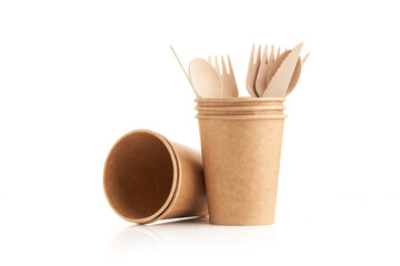 Kitchenware consisting of eco friendly disposable wooden cutlery and paper cup on white background....