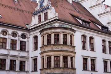 Fototapeta premium Munich, Germany - December 19 2021: Street view of the facade of the building in Munich downtown.