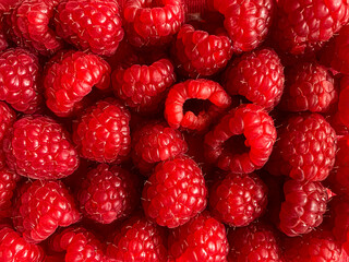 Raspberry background. Full frame textured berry background. Healthy lifestyle and healthy eating...