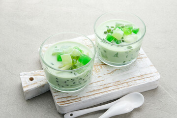 Buko Pandan, a dessert from Philippines, made from jelly, young coconut, evaporated milk, sweetened...