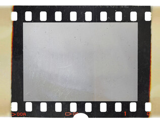 single 35mm film strip with burned edges or sides isolated on white background. detail scan of film material. - obrazy, fototapety, plakaty